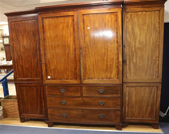 A George IV mahogany breakfront wardrobe, W.265cm